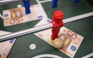 Money on soccer table