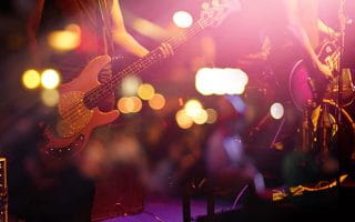 A Live Band Playing on a Stage