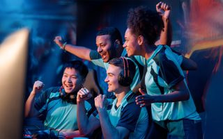 An image of an E-Sports team celebrating a win