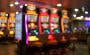 Blurred photo of slot machines in a casino