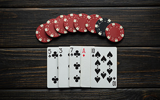 Assorted playing cards and poker chips